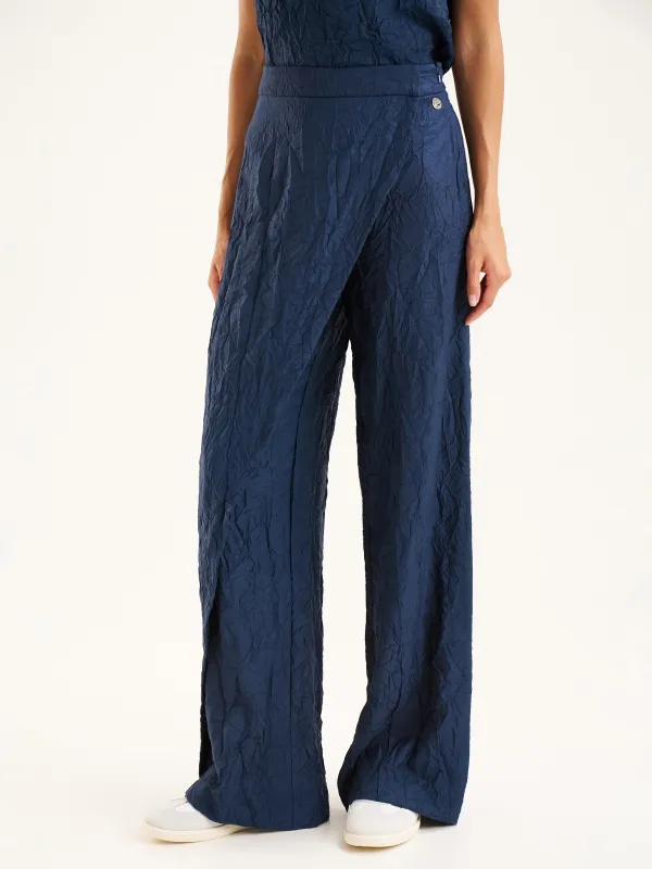 Брюки из жатой ткани асимметричного кроя прямые - G022SZ0780GRET_P Брюки жен. (VR033, 44)