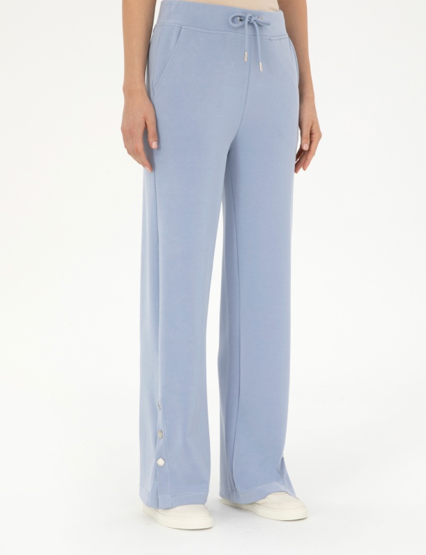 Брюки спортивные с разрезами на кнопках прямые - 